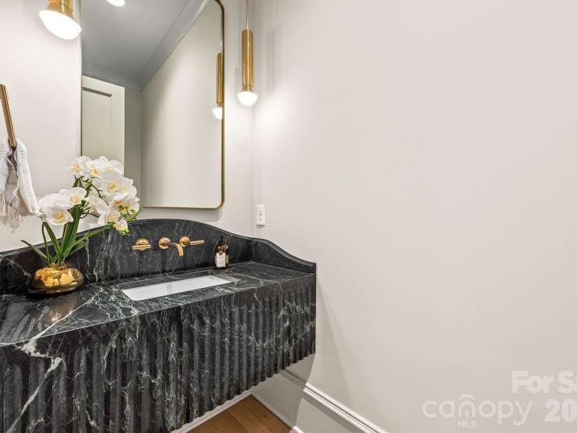 5555 Lansing Drive, Charlotte, NC 28270.  MLS# CAR4395267, YatesRealty ID 38234. Half bath main level