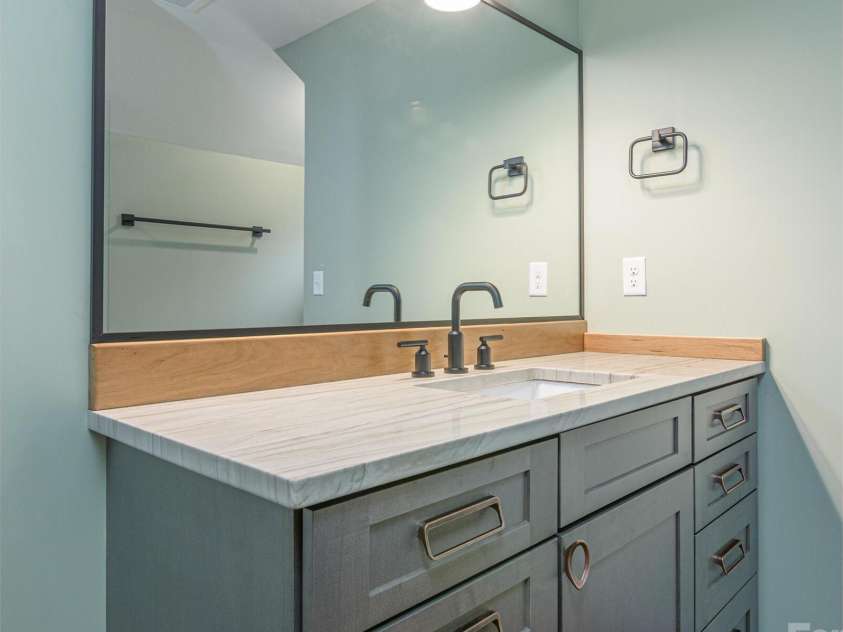 147 Abundance Run, Asheville, NC 28805.  MLS# CAR4240890, YatesRealty ID 3824. Large Vanity in upstairs bath.