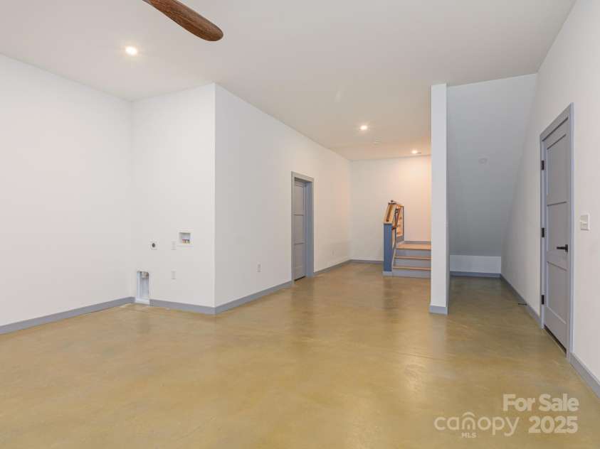 147 Abundance Run, Asheville, NC 28805.  MLS# CAR4240890, YatesRealty ID 3824. Open Basement room good for office/gym or family room.