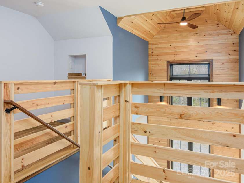 147 Abundance Run, Asheville, NC 28805.  MLS# CAR4240890, YatesRealty ID 3824. Stairway area upstairs with access to view the open main floor.