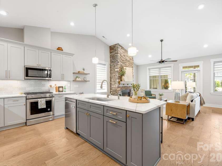 158 Waightstill Drive, Arden, NC 28704.  MLS# CAR4387914, YatesRealty ID 38246. Modern open floor plan features a well-appointed chef’s kitchen with effortless flow throughout the main living spaces.