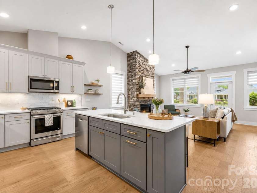 158 Waightstill Drive, Arden, NC 28704.  MLS# CAR4387914, YatesRealty ID 38246. Modern open floor plan features a well-appointed chef’s kitchen with effortless flow throughout the main living spaces.