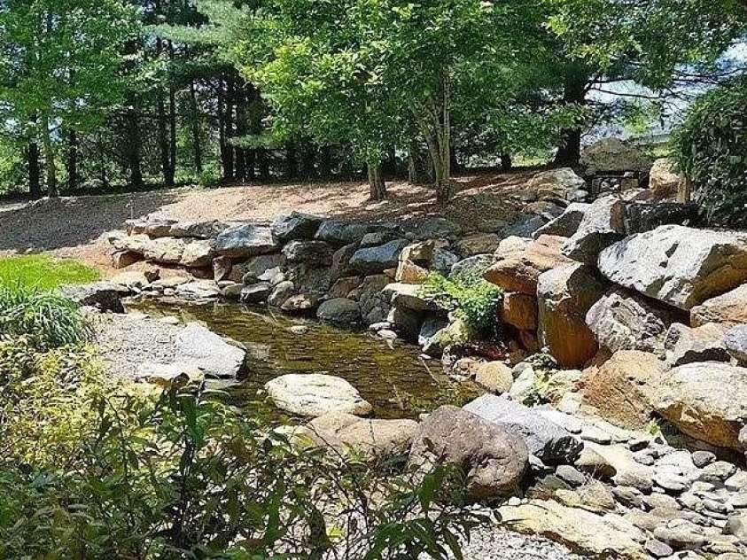 158 Waightstill Drive, Arden, NC 28704.  MLS# CAR4387914, YatesRealty ID 38246. Tranquil Community Water Feature