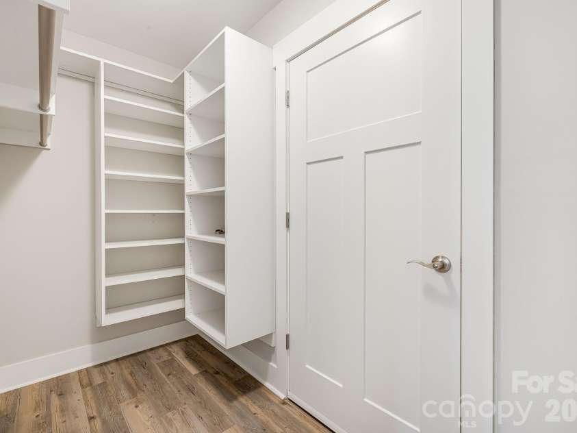 158 Waightstill Drive, Arden, NC 28704.  MLS# CAR4387914, YatesRealty ID 38246. Walk-in closet with custom built-in shelving and ample storage.