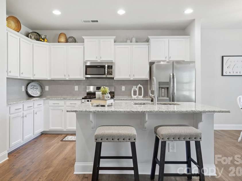 11765 Glenwood Drive, Locust, NC 28097.  MLS# CAR4373388, YatesRealty ID 38249. Beautiful Kitchen with Island