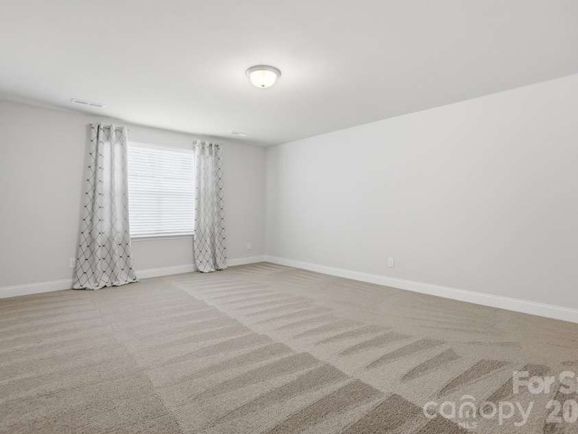 11765 Glenwood Drive, Locust, NC 28097.  MLS# CAR4373388, YatesRealty ID 38249. Bonus Room