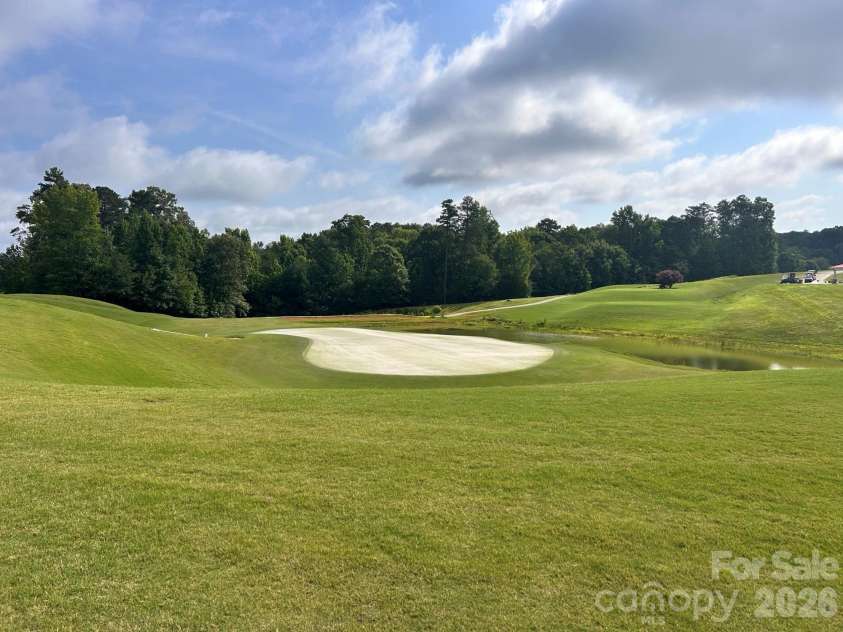 11765 Glenwood Drive, Locust, NC 28097.  MLS# CAR4373388, YatesRealty ID 38249. Hole 18 View