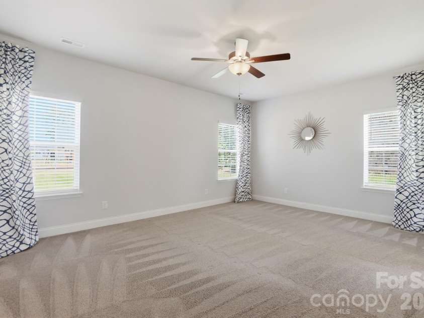 11765 Glenwood Drive, Locust, NC 28097.  MLS# CAR4373388, YatesRealty ID 38249. Primary/Master Suite