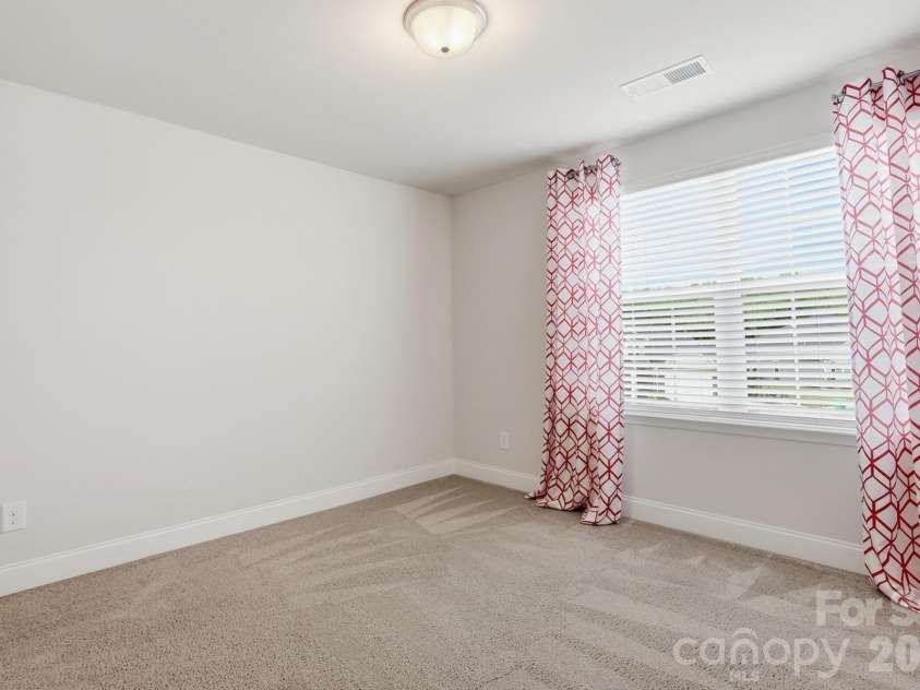11765 Glenwood Drive, Locust, NC 28097.  MLS# CAR4373388, YatesRealty ID 38249. Upstairs BR