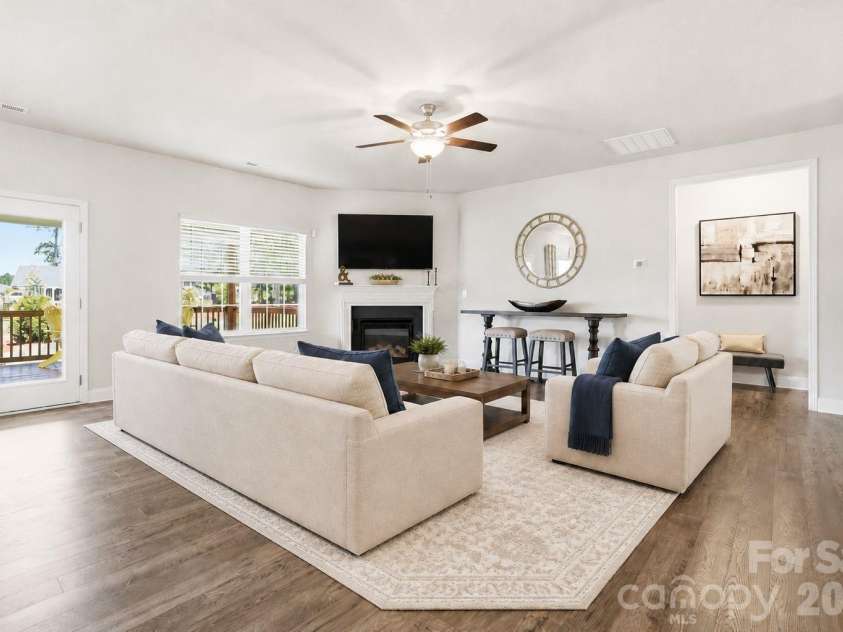 11765 Glenwood Drive, Locust, NC 28097.  MLS# CAR4373388, YatesRealty ID 38249. Virtually Staged Family Room