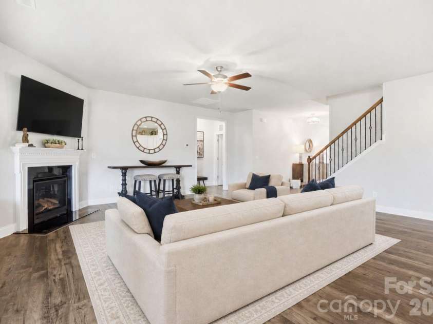 11765 Glenwood Drive, Locust, NC 28097.  MLS# CAR4373388, YatesRealty ID 38249. Virtually Staged Family Room