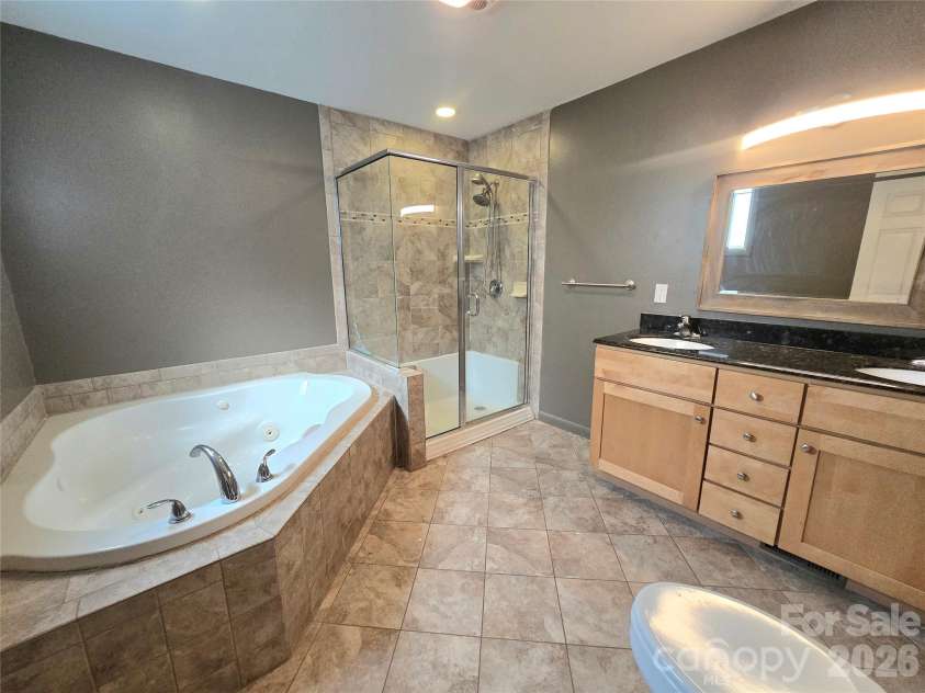 51 Mulberry Court, Arden, NC 28704.  MLS# CAR4311495, YatesRealty ID 3825. Primary bath