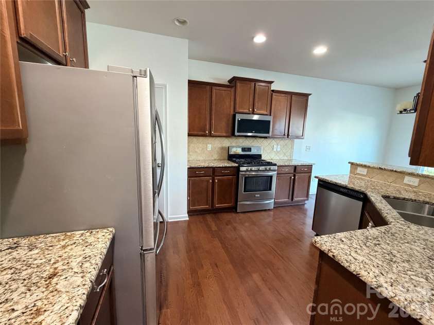 9281 Perseverance Drive, Harrisburg, NC 28075.  MLS# CAR4399173, YatesRealty ID 38250. 