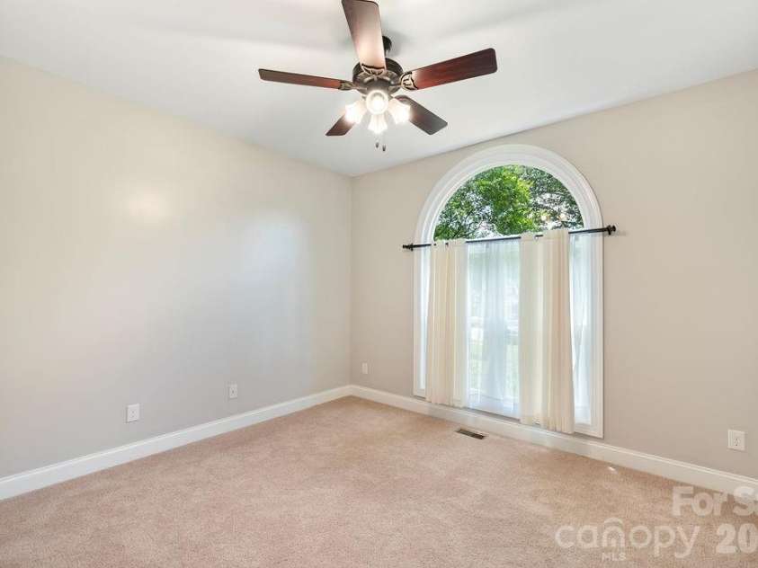 10846 Tyler Brook Lane, Mint Hill, NC 28227.  MLS# CAR4392416, YatesRealty ID 38253. Front Secondary Bedroom