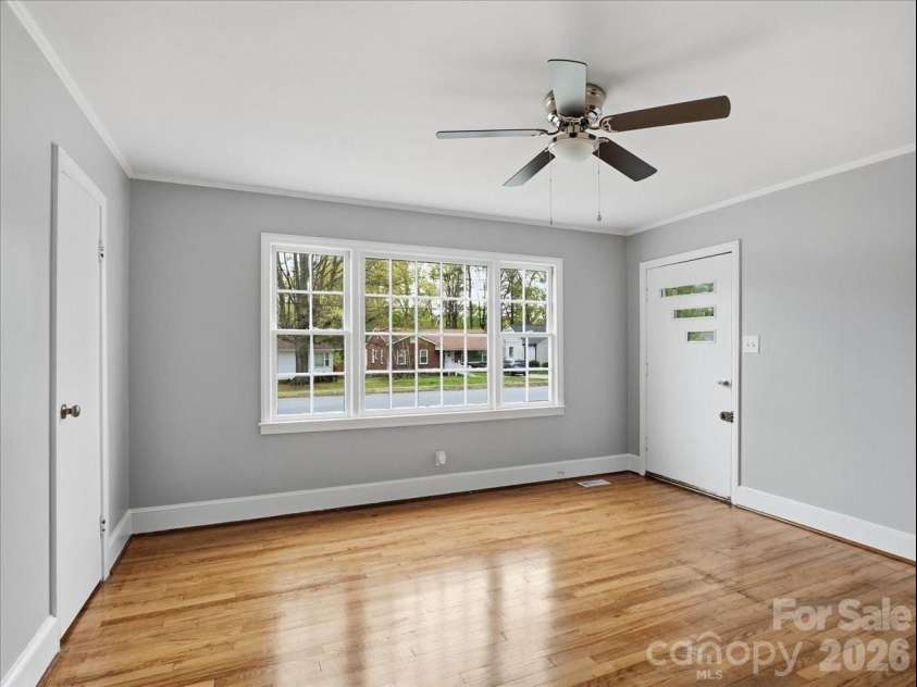 702 Rockwood Drive, Rock Hill, SC 29730.  MLS# CAR4364183, YatesRealty ID 38257. Living room with large front windows