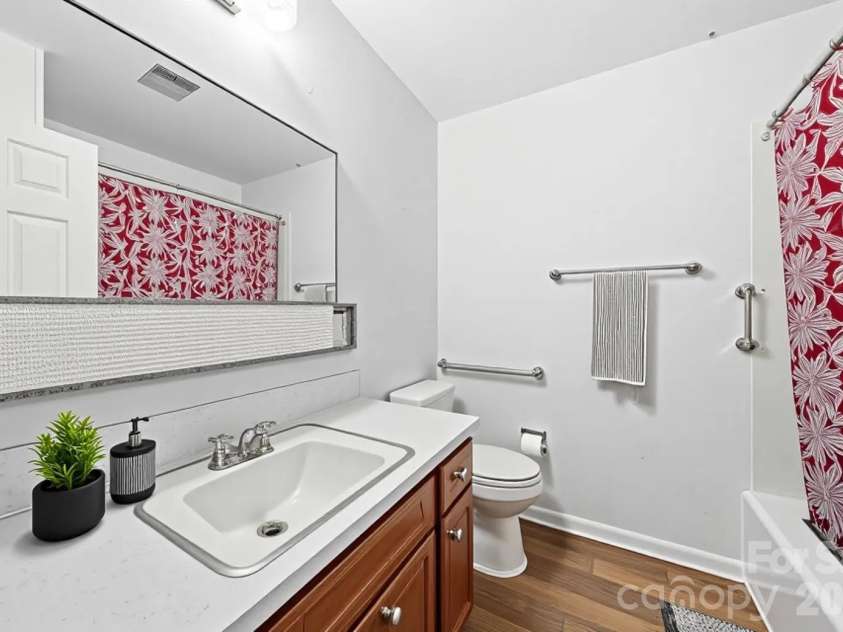 323 Meadowbrook Drive, Matthews, NC 28104.  MLS# CAR4403089, YatesRealty ID 38259. Guest Bathroom(virtual staging)