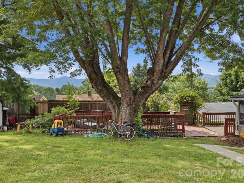 108 Patton Avenue, Canton, NC 28716.  MLS# CAR4400463, YatesRealty ID 38266. Backyard and deck
