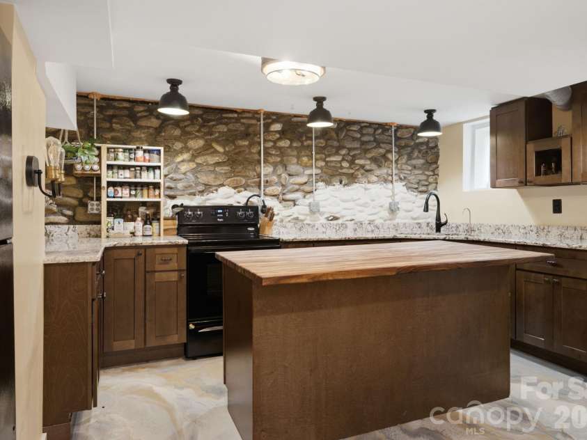 108 Patton Avenue, Canton, NC 28716.  MLS# CAR4400463, YatesRealty ID 38266. Downstairs Kitchen
