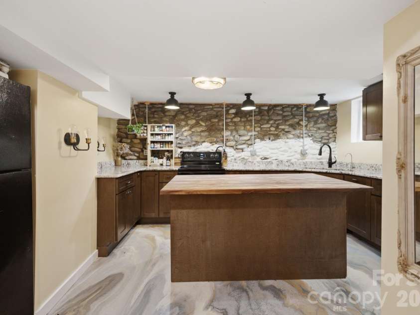 108 Patton Avenue, Canton, NC 28716.  MLS# CAR4400463, YatesRealty ID 38266. Downstairs Kitchen