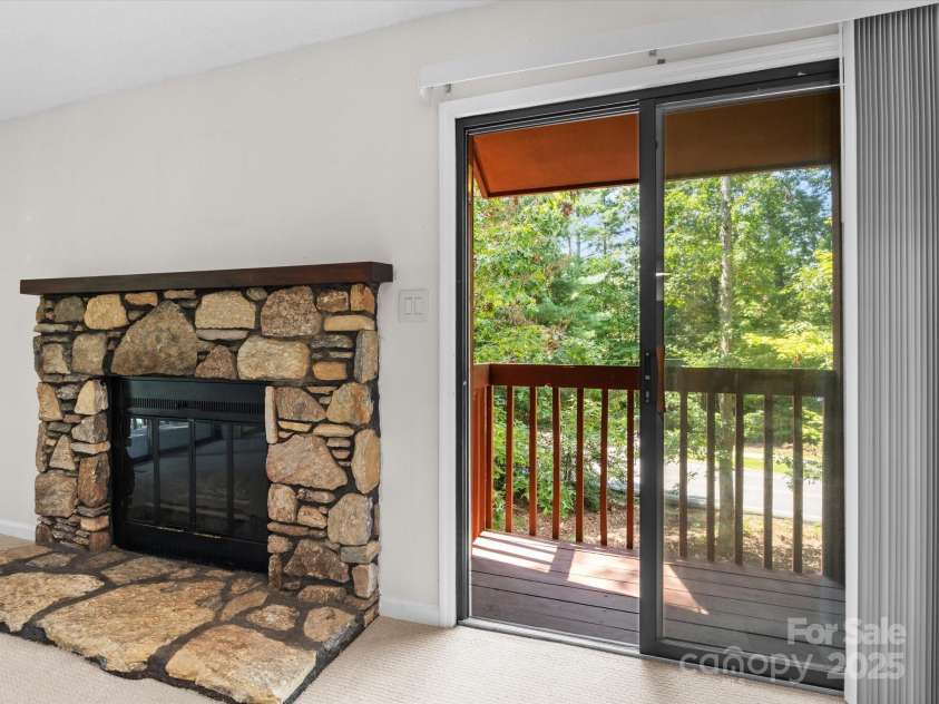 102 Cedar Forest Trail, Asheville, NC 28803.  MLS# CAR4292166, YatesRealty ID 38272. Side deck off the living room