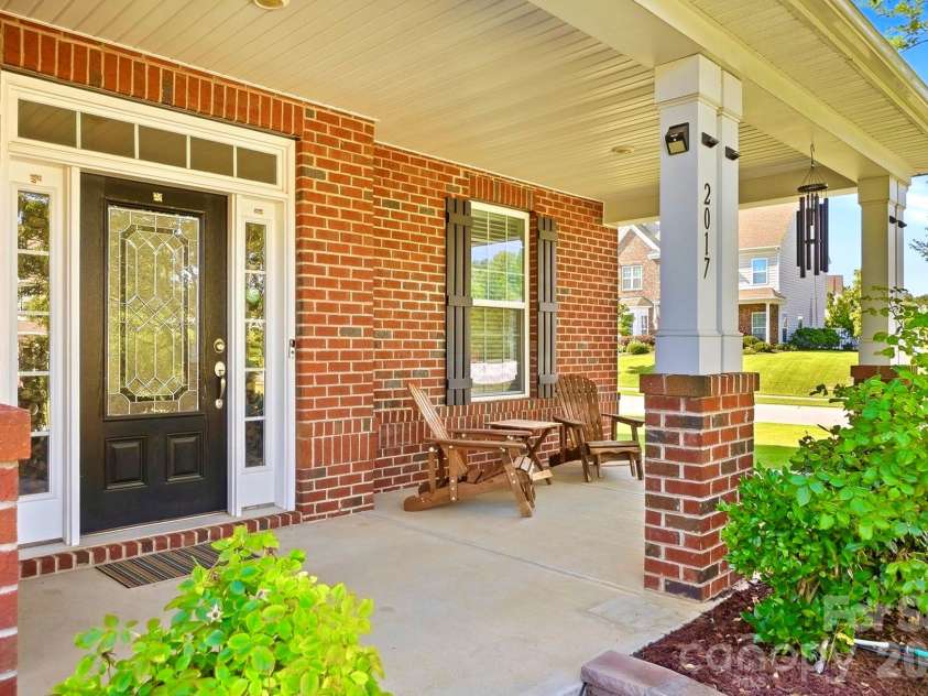 2017 Topaz Plaza, Davidson, NC 28036.  MLS# CAR4404938, YatesRealty ID 38280. HUGE Front Porch