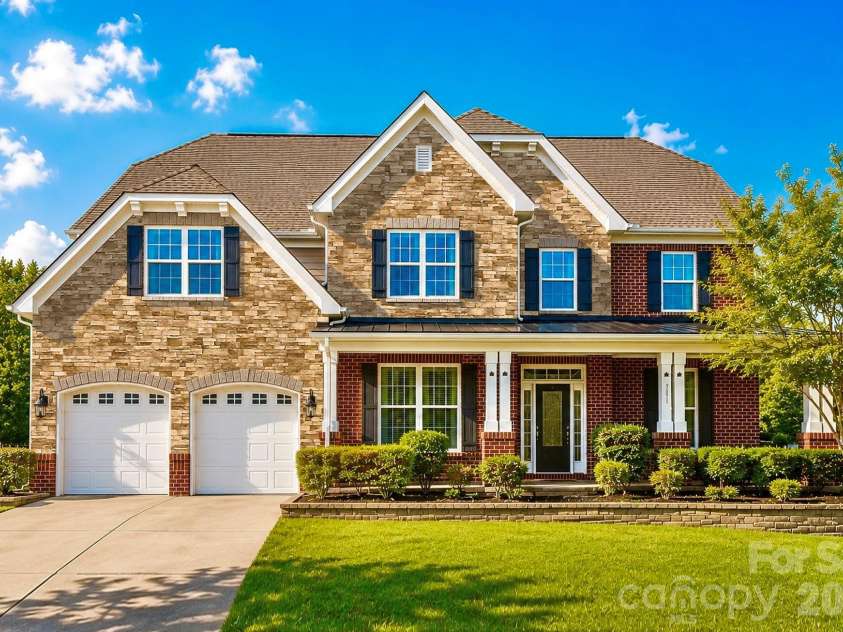 2017 Topaz Plaza, Davidson, NC 28036.  MLS# CAR4404938, YatesRealty ID 38280. Incredible Craftsman Style Elevation