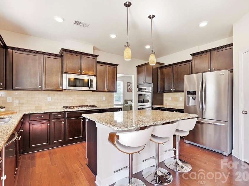 2017 Topaz Plaza, Davidson, NC 28036.  MLS# CAR4404938, YatesRealty ID 38280. Kitchen with massive island