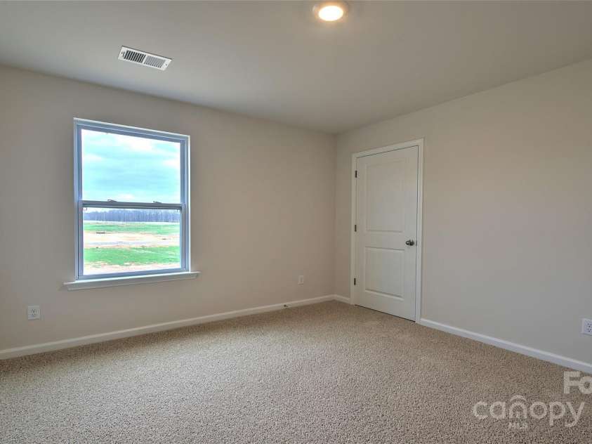 188 Shorthorn Road, Fletcher, NC 28732.  MLS# CAR4242369, YatesRealty ID 3829. Photos are representative
