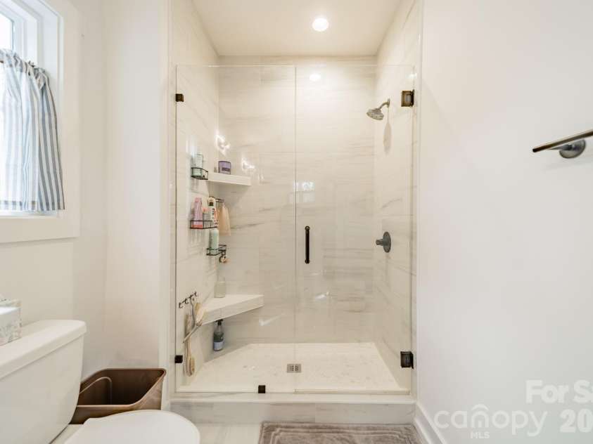 608 Ambassador Street, Charlotte, NC 28208.  MLS# CAR4342257, YatesRealty ID 3829. Primary Shower
