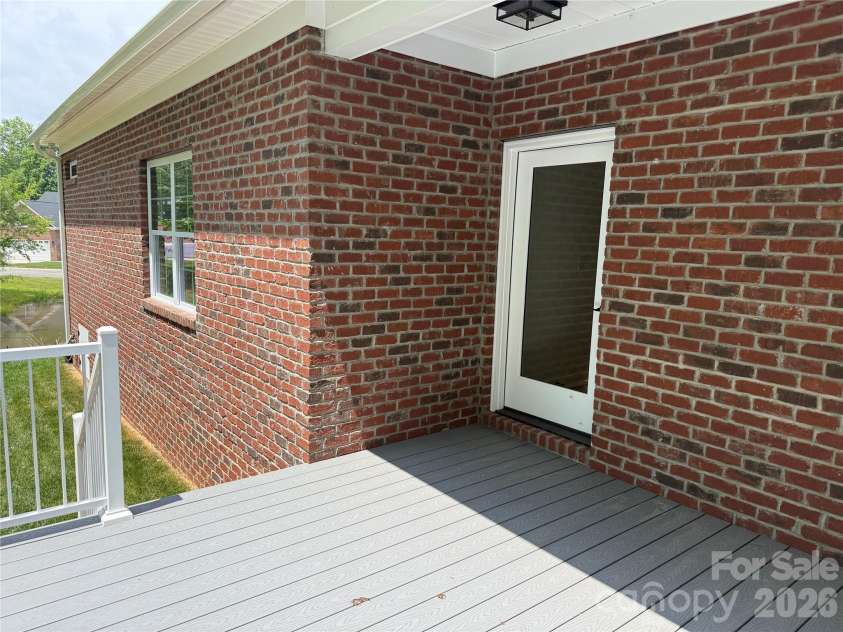 107 Abbington Lane, Shelby, NC 28150.  MLS# CAR4380536, YatesRealty ID 38298. There is an awesome deck off the kitchen...