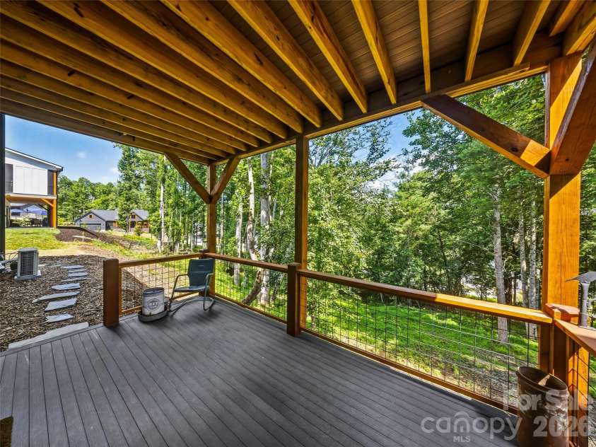 181 Byron Forest Drive, Horse Shoe, NC 28742.  MLS# CAR4400079, YatesRealty ID 38308. LL covered porch