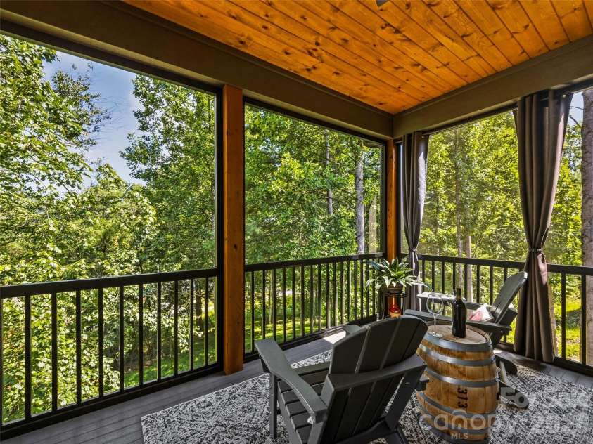181 Byron Forest Drive, Horse Shoe, NC 28742.  MLS# CAR4400079, YatesRealty ID 38308. Screen porch