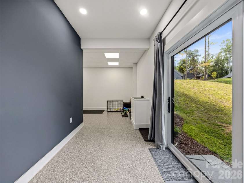 181 Byron Forest Drive, Horse Shoe, NC 28742.  MLS# CAR4400079, YatesRealty ID 38308. Sliding door to outside