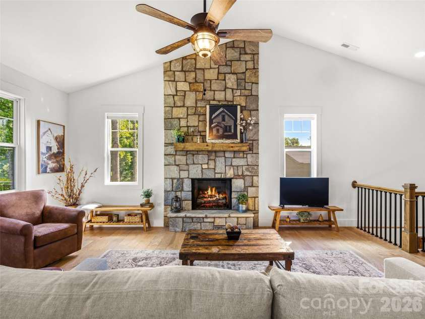 181 Byron Forest Drive, Horse Shoe, NC 28742.  MLS# CAR4400079, YatesRealty ID 38308. Stone fireplace