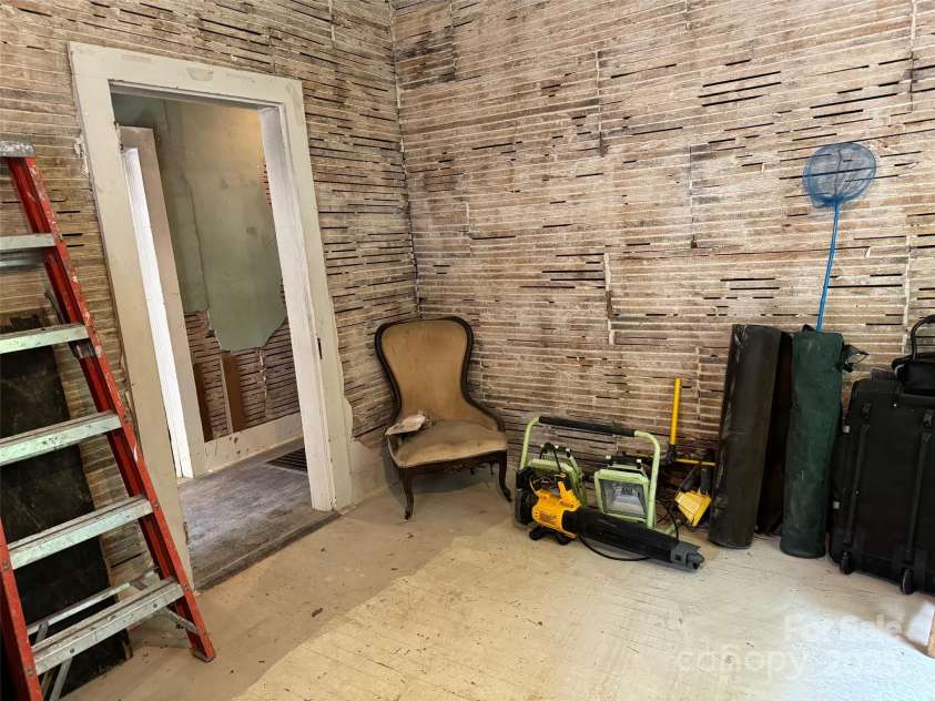 305 Ficker Circle, Hendersonville, NC 28739.  MLS# CAR4240043, YatesRealty ID 3831. Cottage is ready for renovation.
