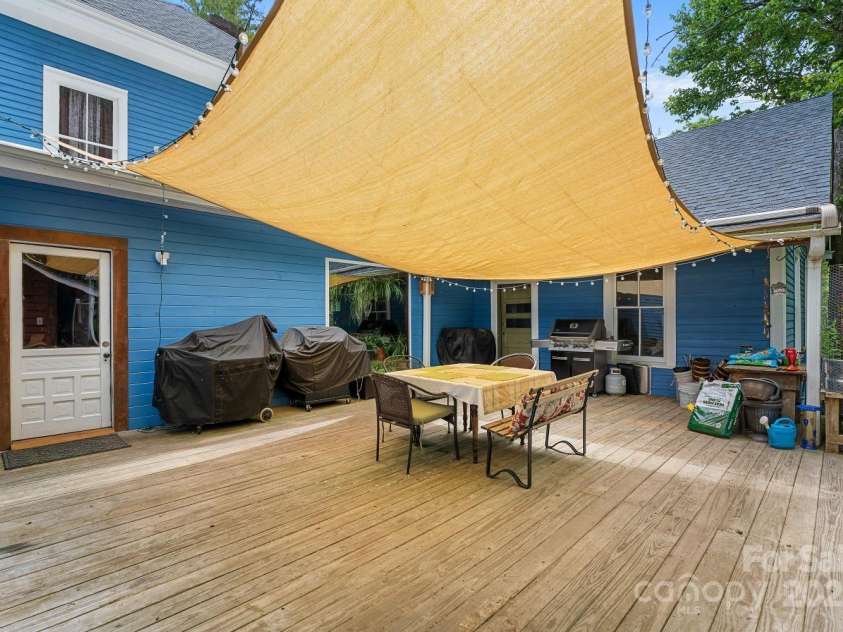 305 Ficker Circle, Hendersonville, NC 28739.  MLS# CAR4240043, YatesRealty ID 3831. Courtyard deck
