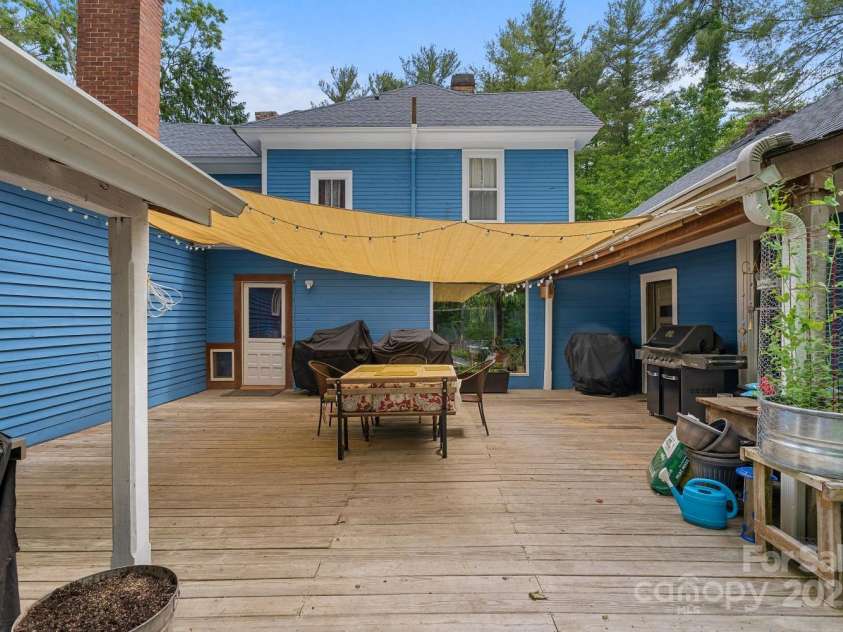 305 Ficker Circle, Hendersonville, NC 28739.  MLS# CAR4240043, YatesRealty ID 3831. Courtyard deck (view facing kitchen in main house)
