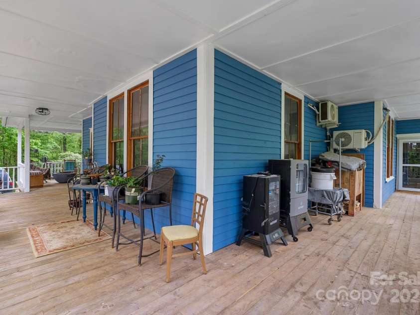 305 Ficker Circle, Hendersonville, NC 28739.  MLS# CAR4240043, YatesRealty ID 3831. Large wraparound porch