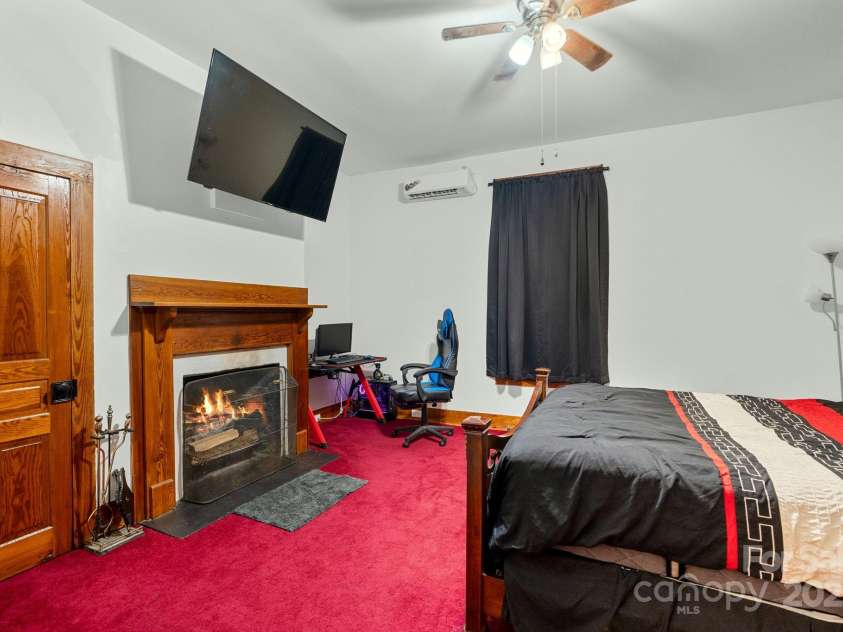 305 Ficker Circle, Hendersonville, NC 28739.  MLS# CAR4240043, YatesRealty ID 3831. Main-level bedroom.