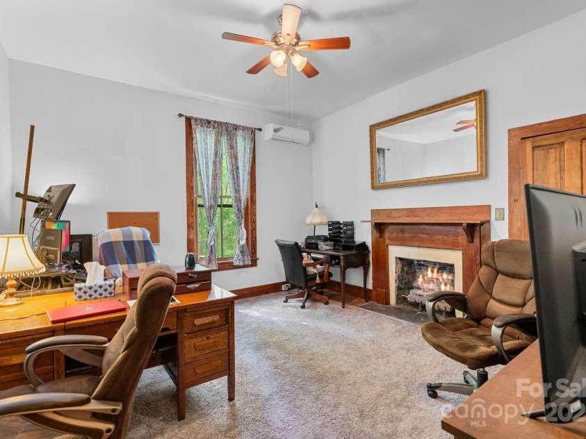 305 Ficker Circle, Hendersonville, NC 28739.  MLS# CAR4240043, YatesRealty ID 3831. Main-level sitting room or bedroom.