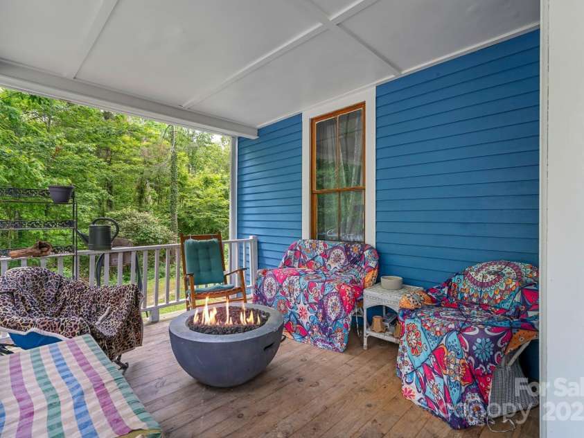 305 Ficker Circle, Hendersonville, NC 28739.  MLS# CAR4240043, YatesRealty ID 3831. Perfect for outdoor relaxing, greeting guests.