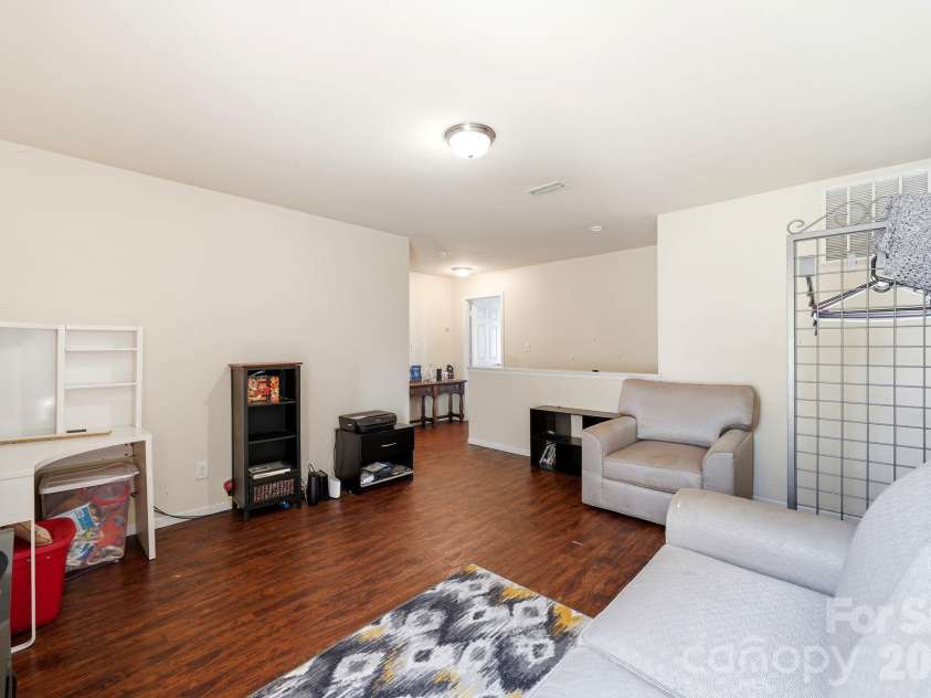 4411 Palustris Court, Charlotte, NC 28269.  MLS# CAR4403612, YatesRealty ID 38311. 