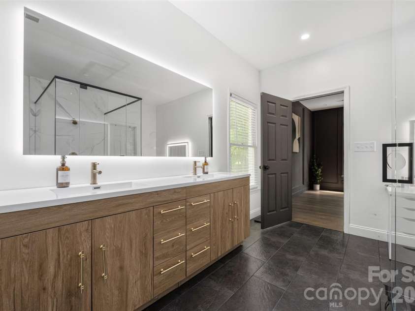 1800 Chestnut Lane, Matthews, NC 28104.  MLS# CAR4379528, YatesRealty ID 38317. Backlit mirror
