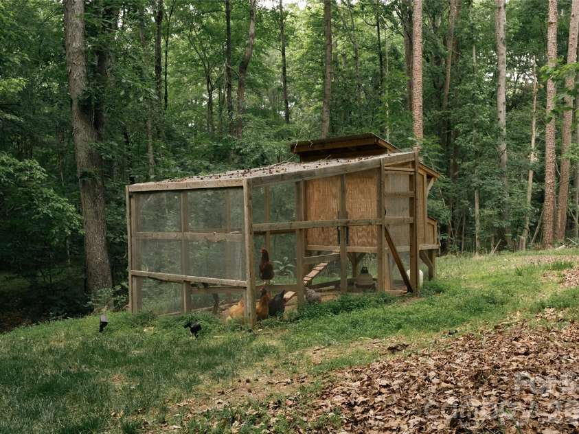 1800 Chestnut Lane, Matthews, NC 28104.  MLS# CAR4379528, YatesRealty ID 38317. Custom built chicken coop