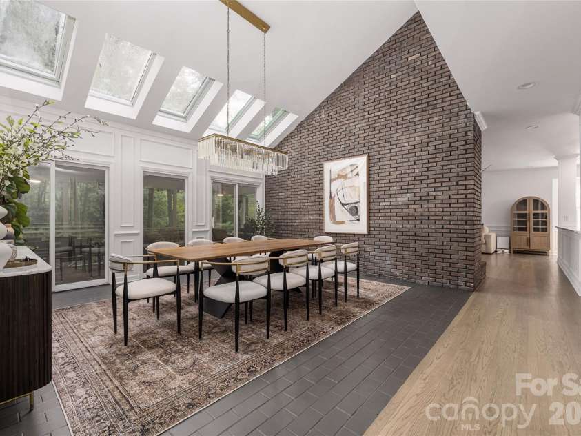 1800 Chestnut Lane, Matthews, NC 28104.  MLS# CAR4379528, YatesRealty ID 38317. Dining Area with Skylight Windows
