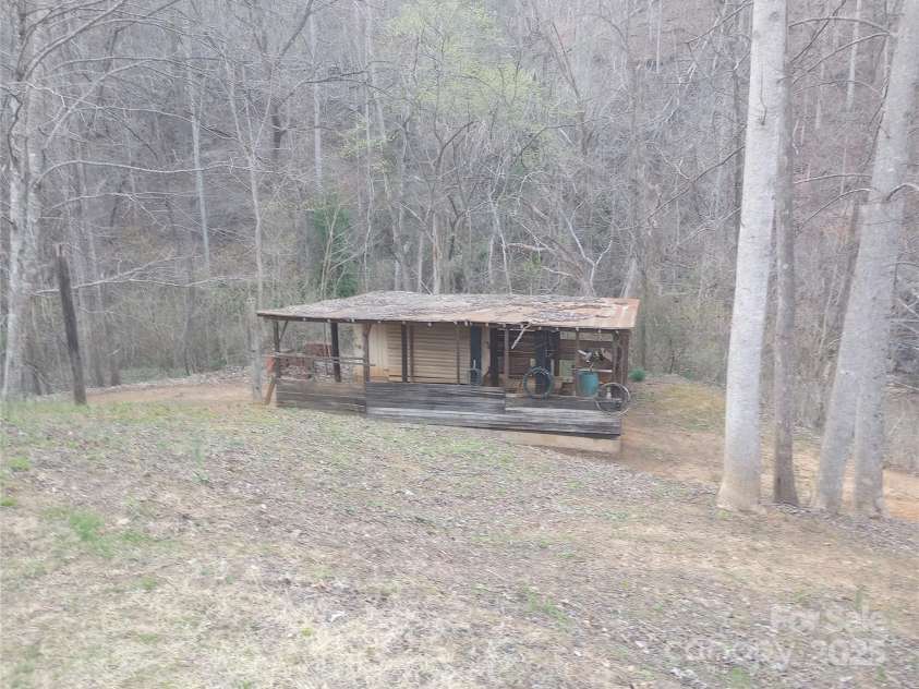 358 Carson Elliott Drive, Marion, NC 28752.  MLS# CAR4240915, YatesRealty ID 3832. Shed by creek