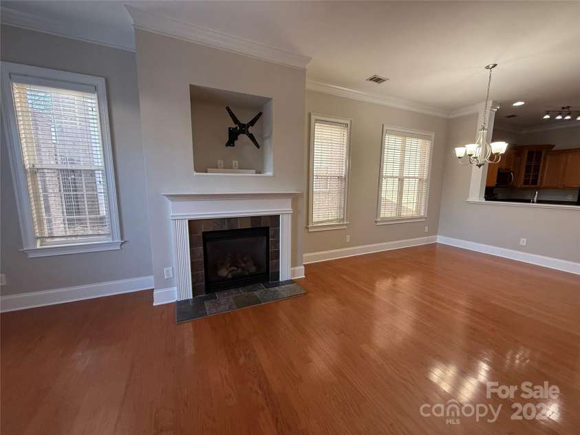 5773 Village Drive, Concord, NC 28027.  MLS# CAR4200719, YatesRealty ID 3833. Gas fireplae and wood floors