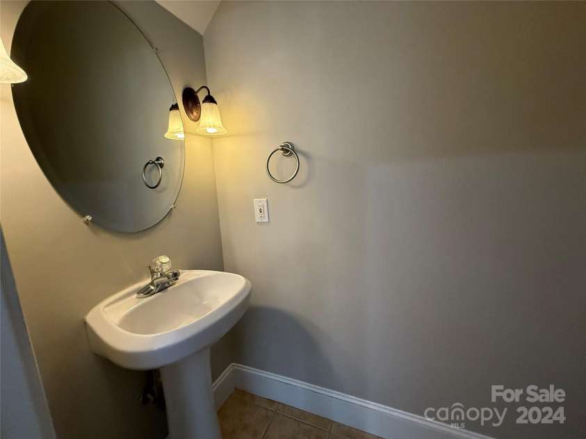 5773 Village Drive, Concord, NC 28027.  MLS# CAR4200719, YatesRealty ID 3833. Guest bath main floor