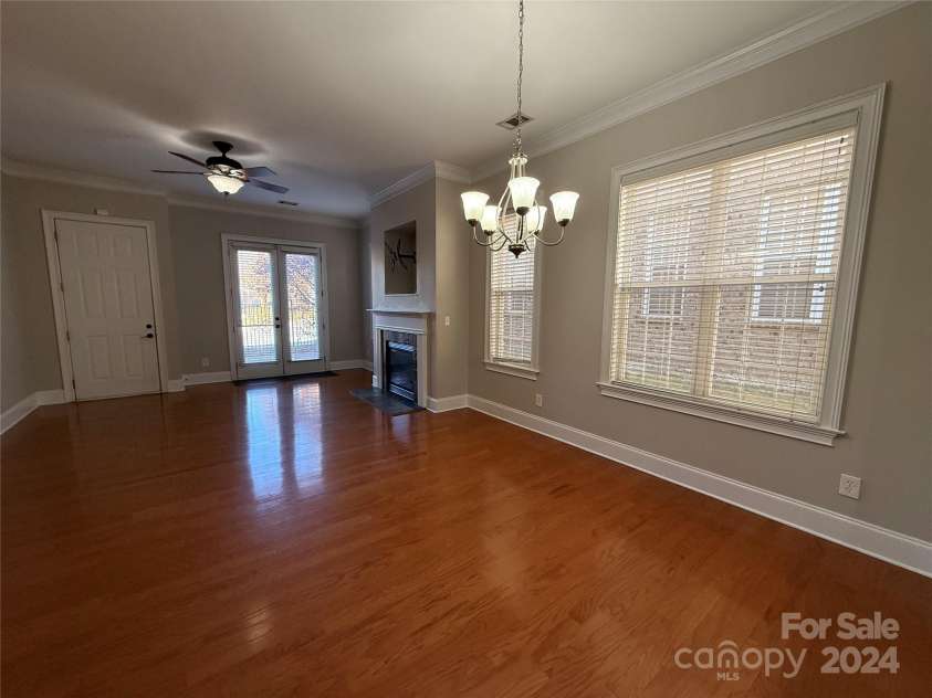 5773 Village Drive, Concord, NC 28027.  MLS# CAR4200719, YatesRealty ID 3833. Open family room to kitchen- view from kitchen