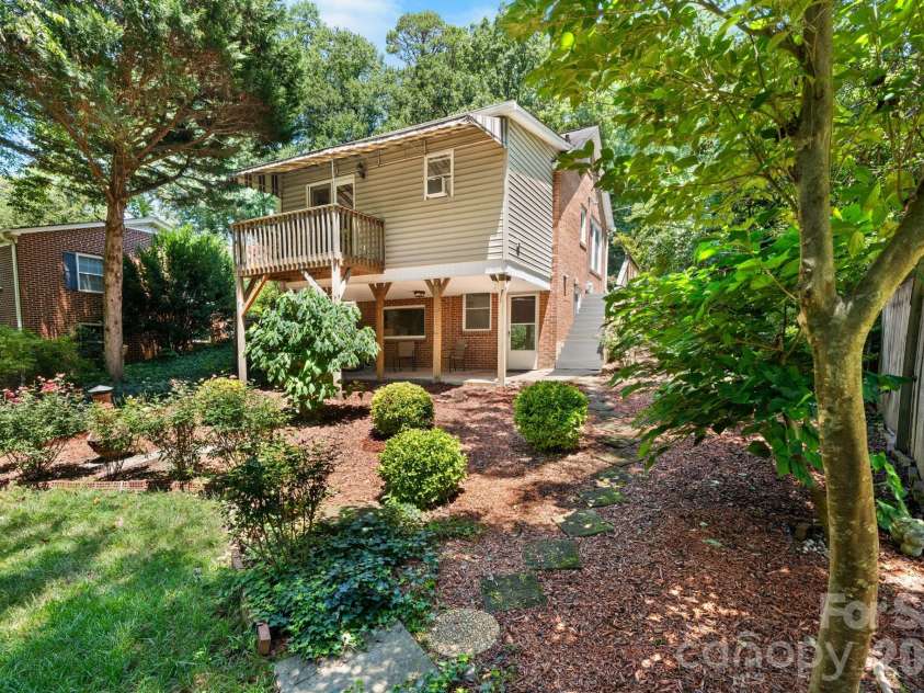 407 10th Street Drive, Hickory, NC 28601.  MLS# CAR4405219, YatesRealty ID 38350. View from back yard with steps going up to the front.